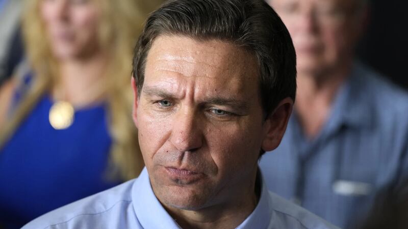 Republican presidential candidate Florida Gov. Ron DeSantis speaks to reporters at U.S. Rep....