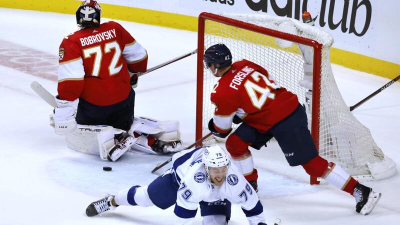 Tampa Bay Lightning center Ross Colton (79) falls after scoring against Florida Panthers...
