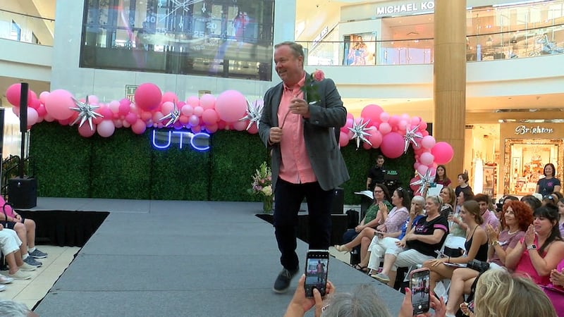 MEN STRUT THEIR STUFF ON THE RUNWAY AT THE EVENT