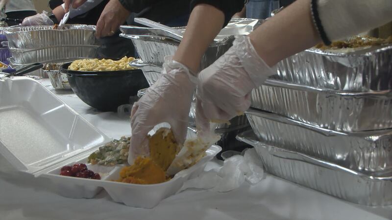Volunteers gathered at Temple Sinai to make 300 Thanksgiving meals for families in need in...