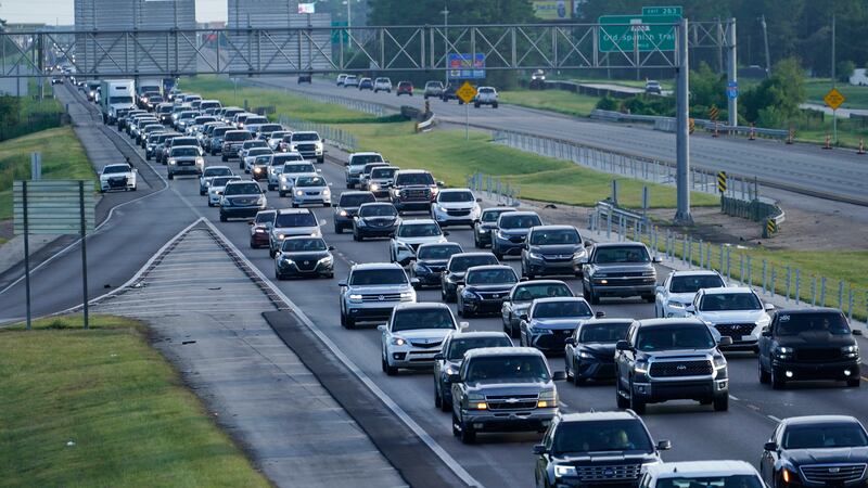 Heavy traffic clogs Interstate 10 out of New Orleans as residents and visitors evacuate for...